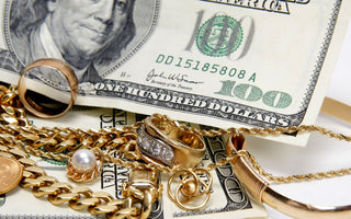 jewelry and money on a table