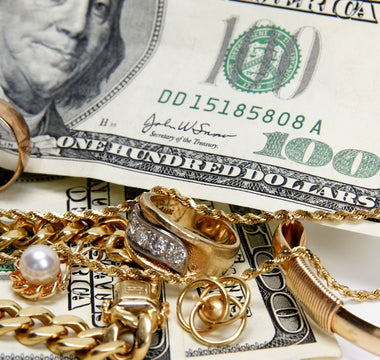 jewelry and money on a table