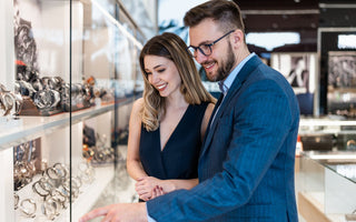 a couple buying jewelry for Christmas 